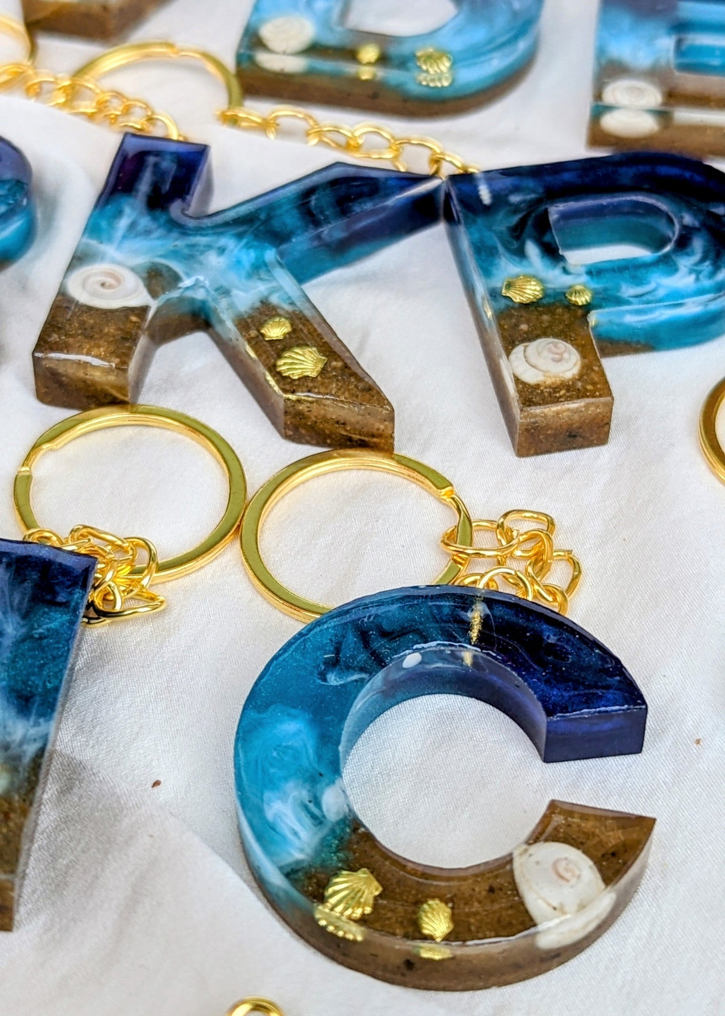 Buchstaben Schlüsselanhänger in Meeresoptik